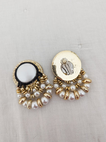 Boucles baroques blanches