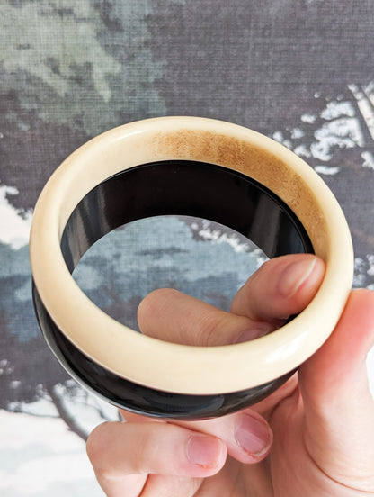 Lot bracelets crème et noir