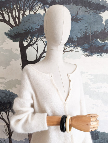 Lot bracelets crème et noir