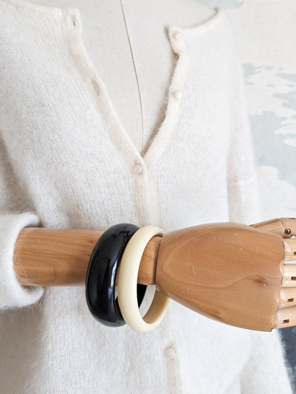 Lot bracelets crème et noir