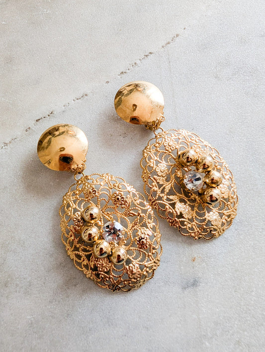 Longues boucles ajourées