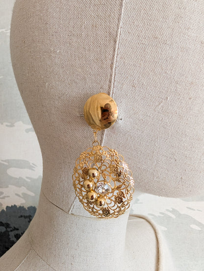 Longues boucles ajourées