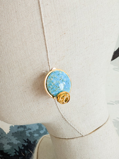 Boucles en pâte de verre