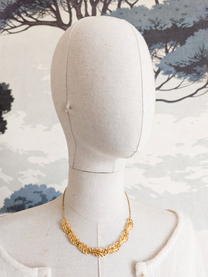 Collier plumes Corocraft