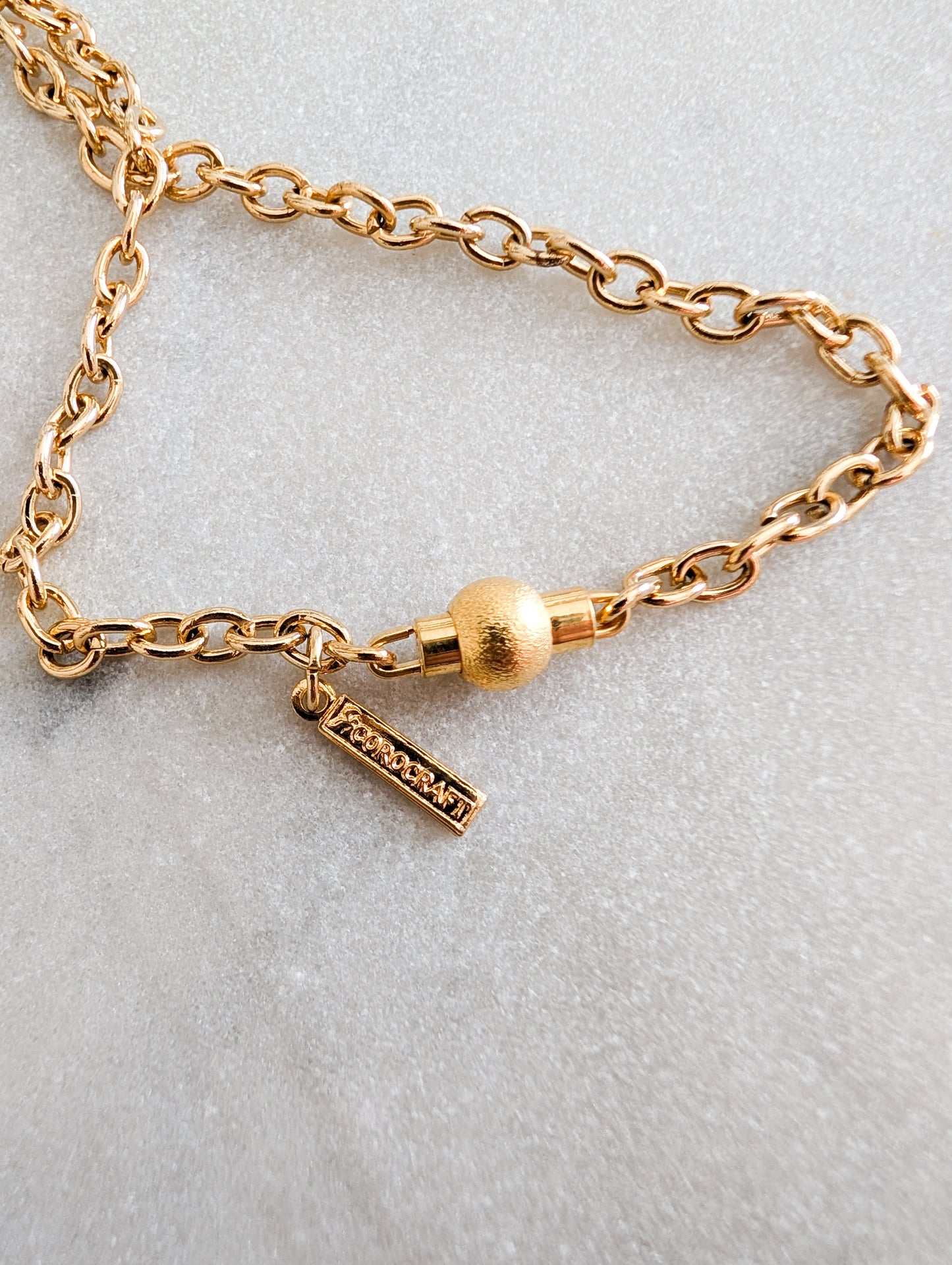 Sautoir 70's Corocraft