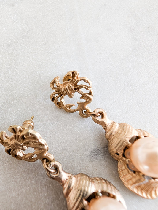 Boucles coquillages oreilles percées