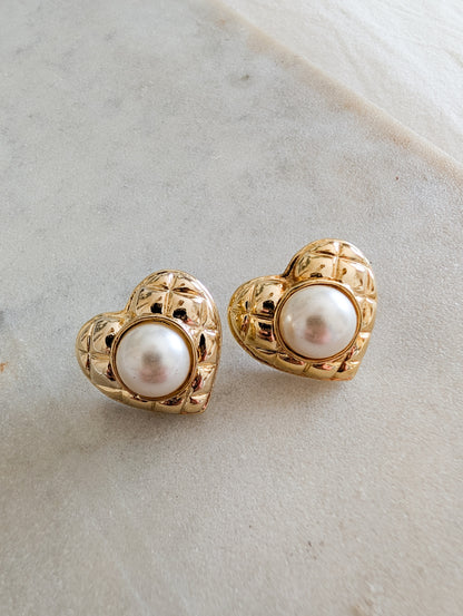Boucles coeurs oreillers percées