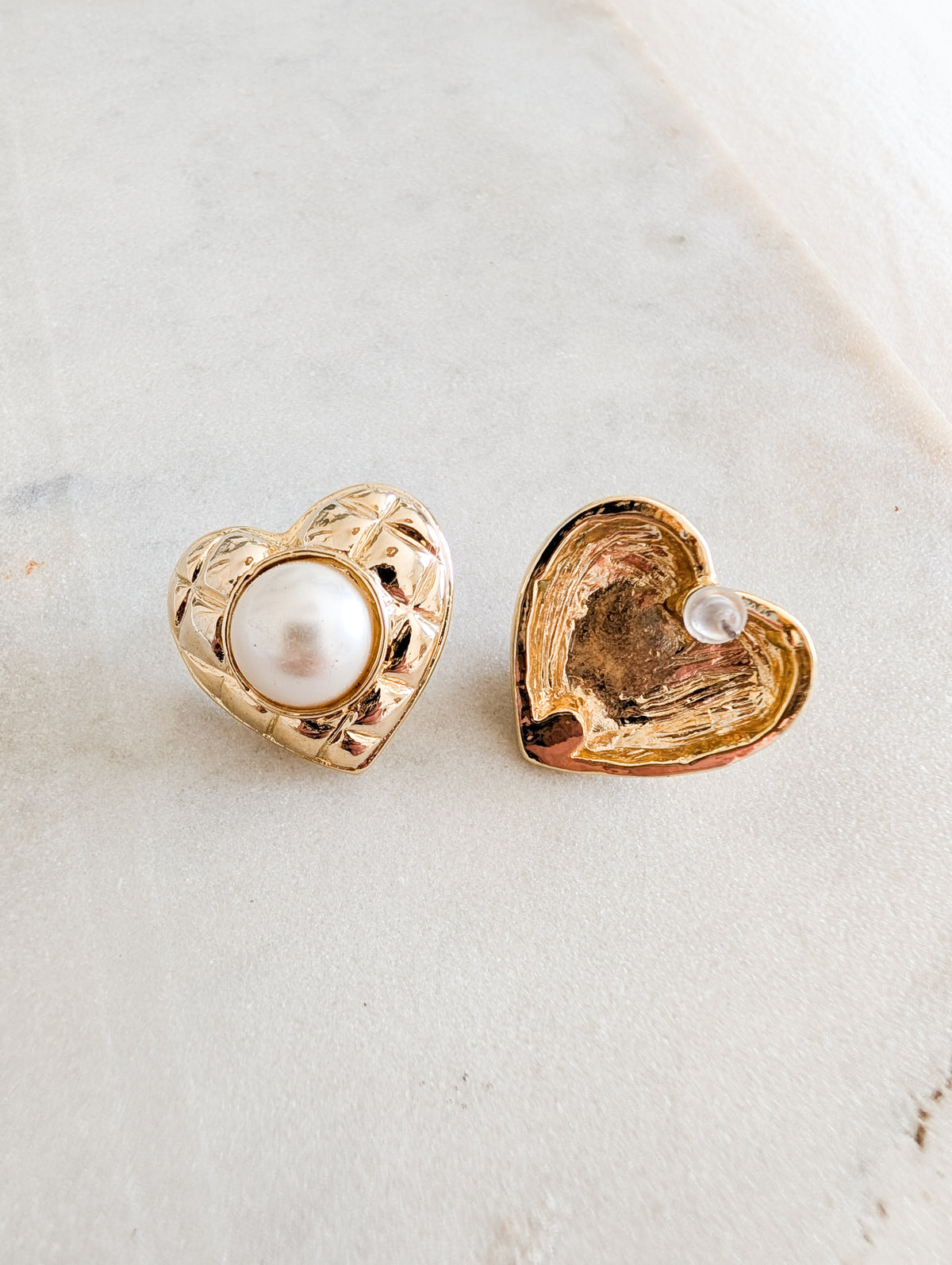 Boucles coeurs oreillers percées