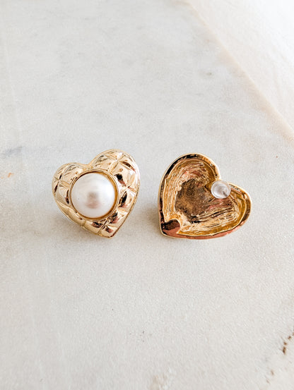 Boucles coeurs oreillers percées