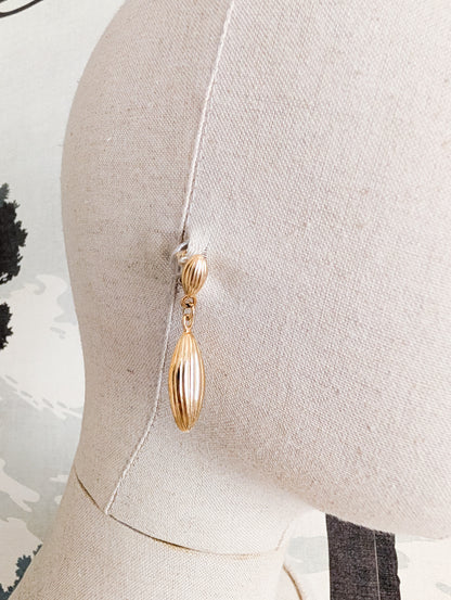 Boucles oreilles percées