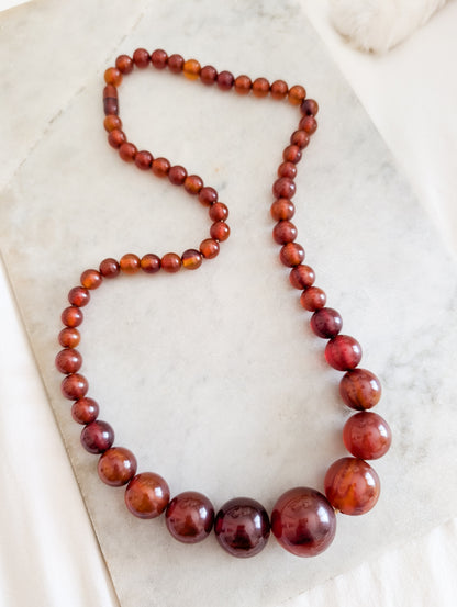 Long collier en Bakélite 1930 perles rondes
