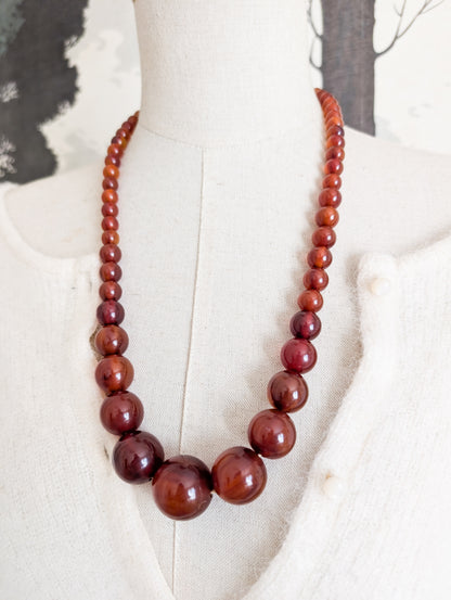Long collier en Bakélite 1930 perles rondes