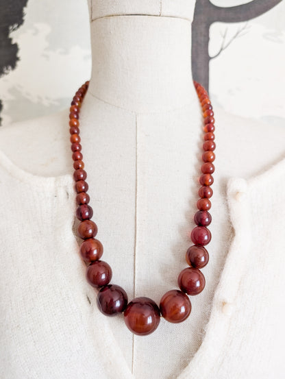 Long collier en Bakélite 1930 perles rondes