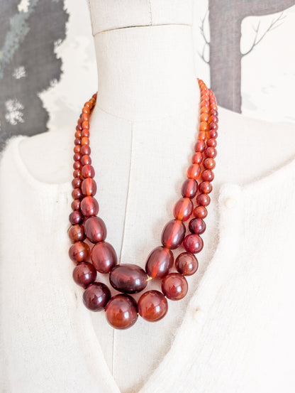 Long collier en Bakélite 1930 perles rondes
