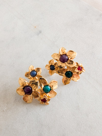 Boucles fleurs américaines oreilles percées