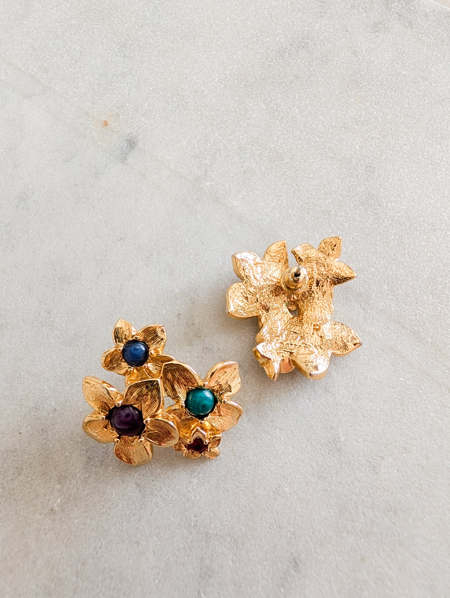 Boucles fleurs américaines oreilles percées