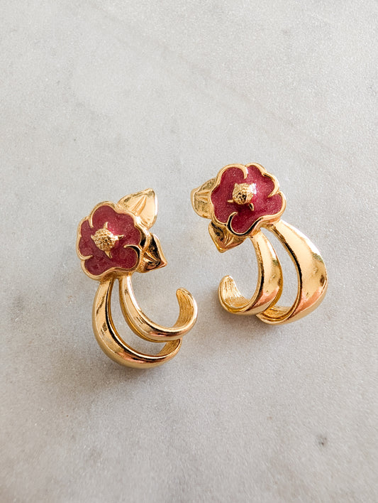 Boucles fleurs américaines oreilles percées