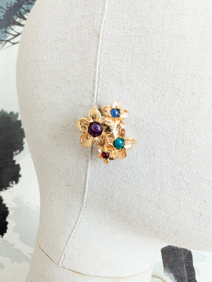 Boucles fleurs américaines oreilles percées