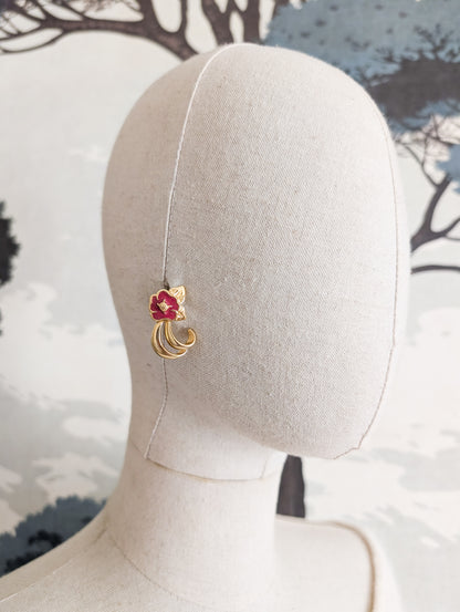 Boucles fleurs américaines oreilles percées