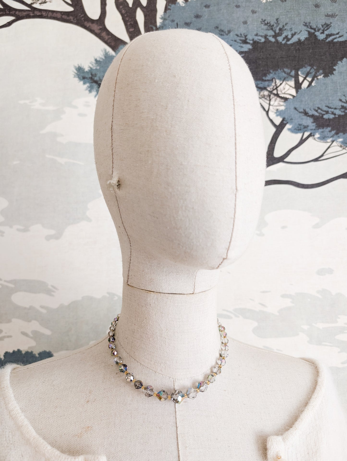 Collier cristal facetté effet Aurore Boréale
