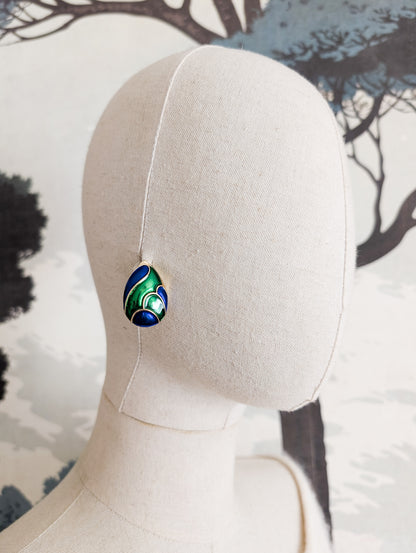 Boucles bleues et vertes oreilles percées