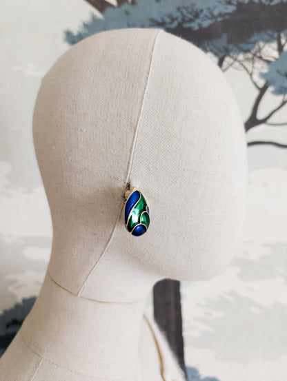 Boucles bleues et vertes oreilles percées