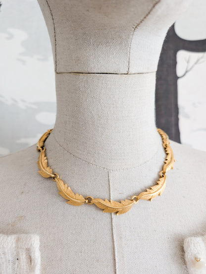 Collier palmes