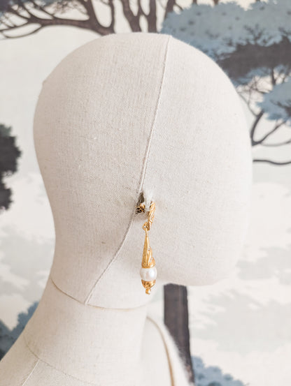 Longues boucles oreilles percées
