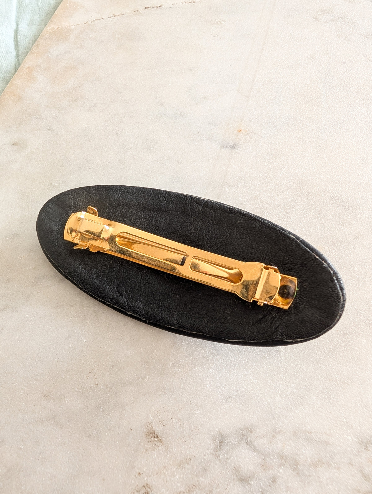 Barrette en cuir 80's