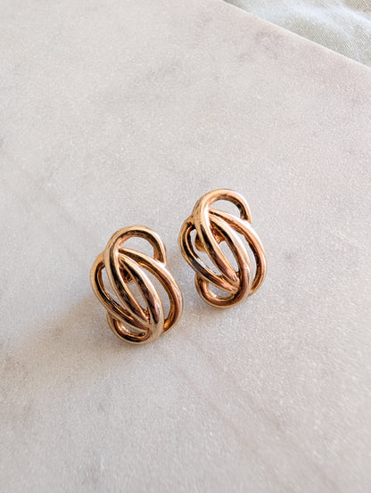 Boucles Arabesques oreilles percées