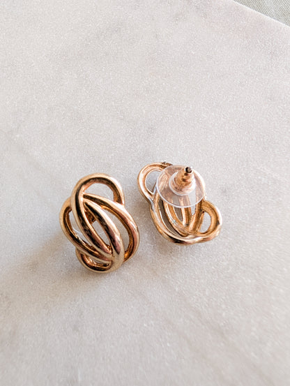 Boucles Arabesques oreilles percées
