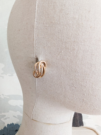 Boucles Arabesques oreilles percées