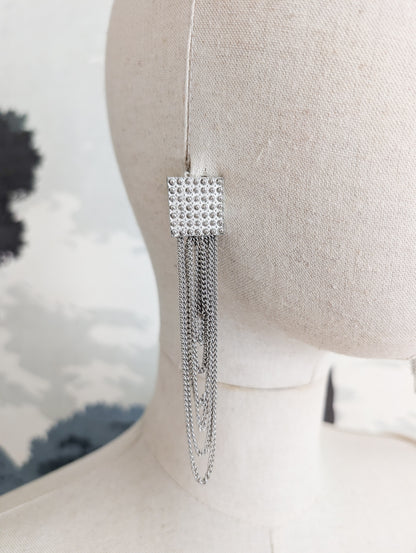 Longues boucles argentées américaines oreilles percées