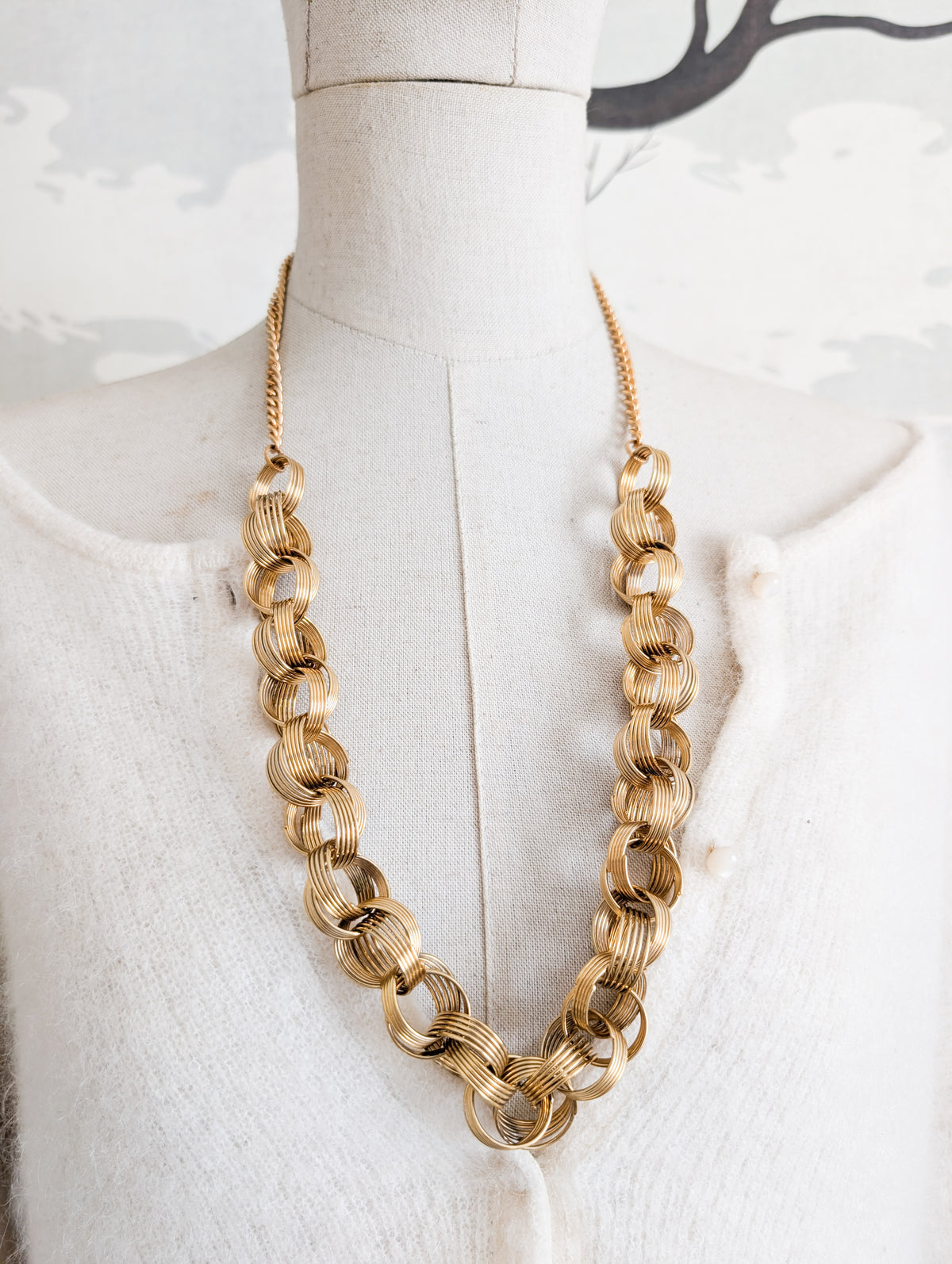 Extraordinaire collier anneaux Corocraft