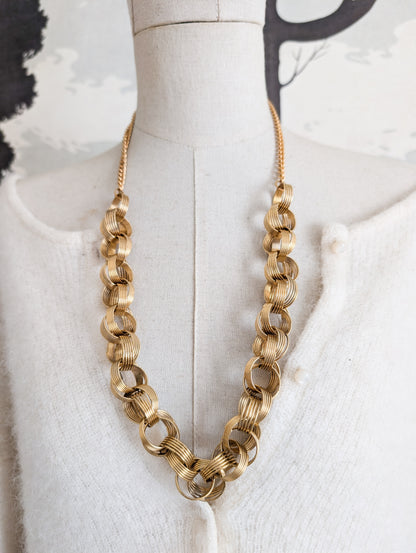 Extraordinaire collier anneaux Corocraft