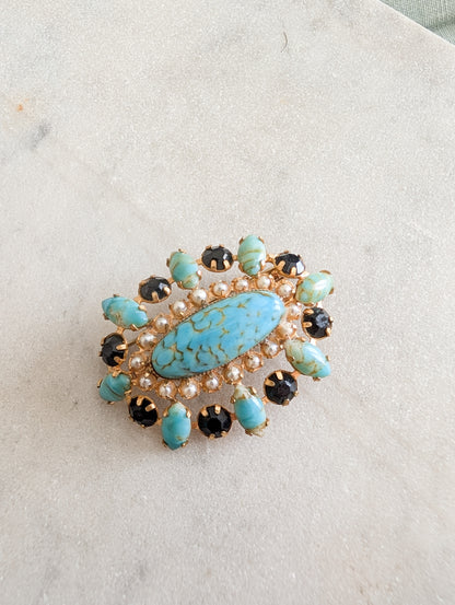 Broche en pâte de verre
