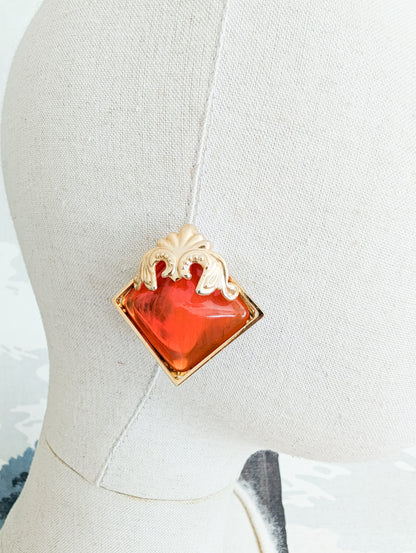 Boucles baroques orange vif