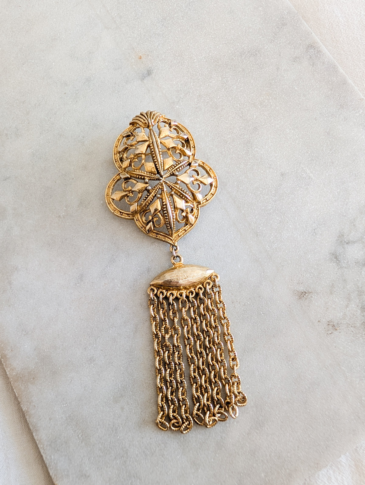 Broche pompon