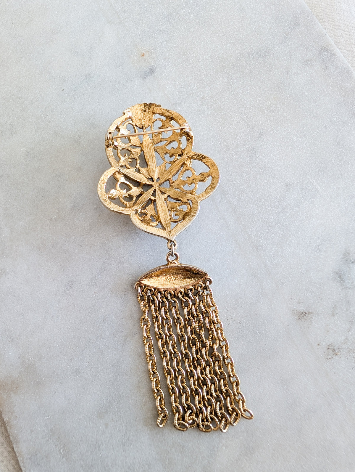 Broche pompon