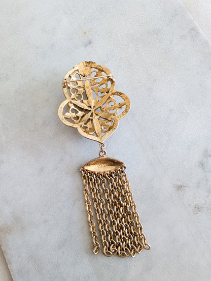 Broche pompon